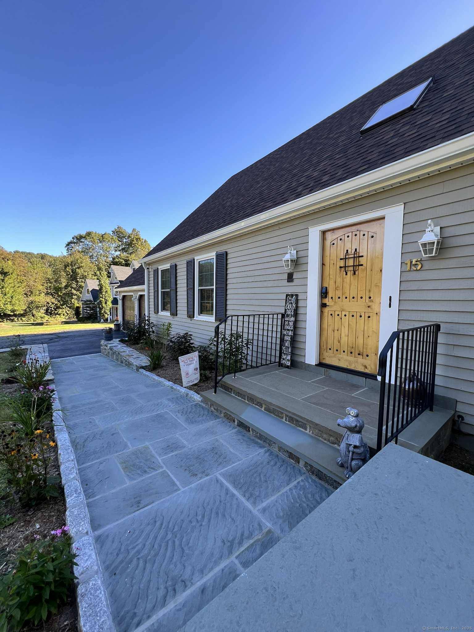 Located at the entrance of a quiet cul de sac, this expansive contemporary Cape sits on over an acre and offers 4 bedrooms and 2 full and 2 half baths.