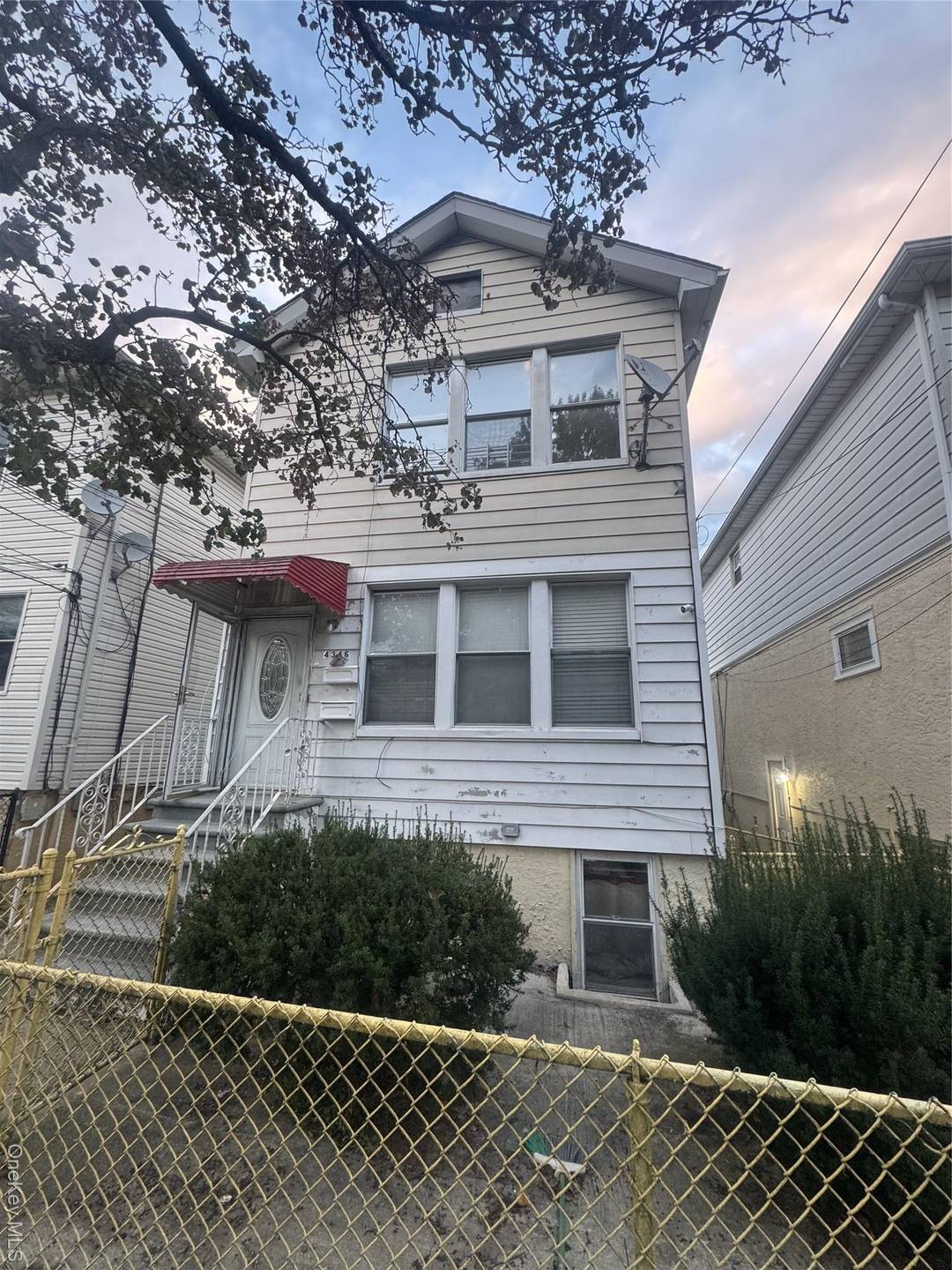 A great opportunity awaits you with this fully detached two family home !