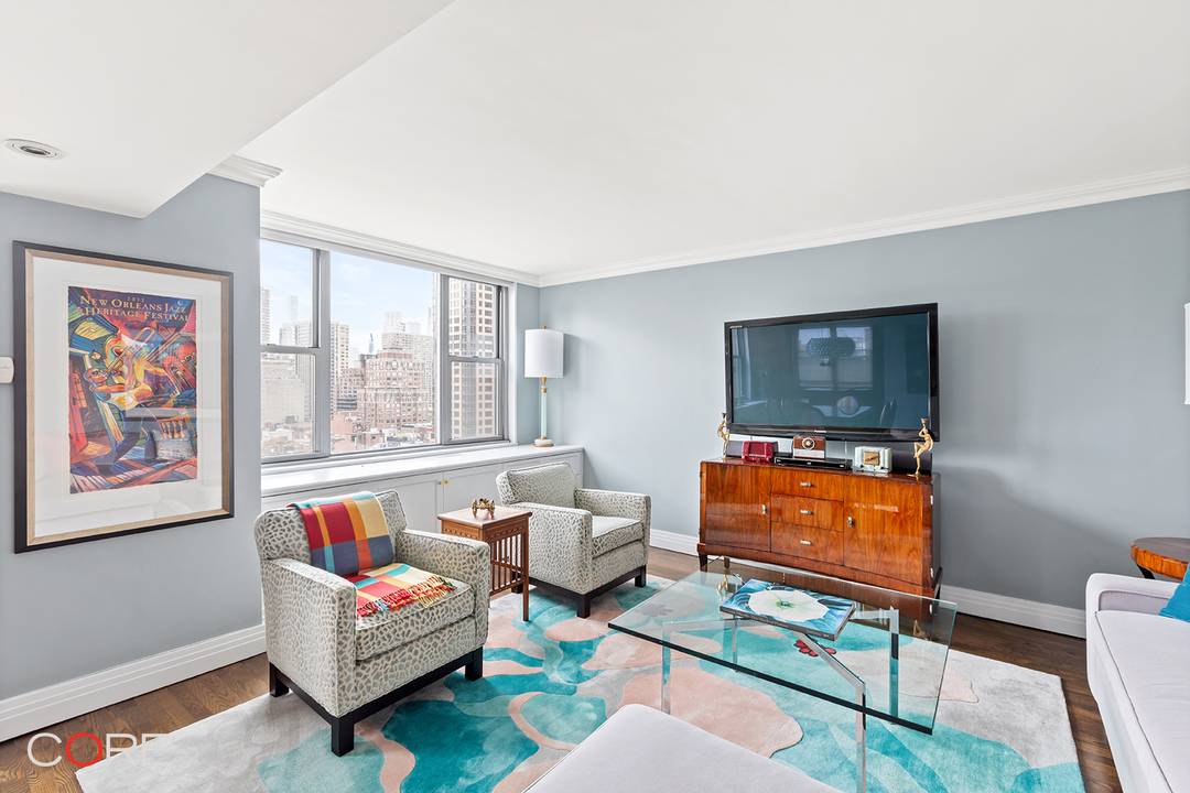 Located on the 17th floor, this expansive four bedroom with a den and four and a half bathrooms spans over 2, 400 square feet.