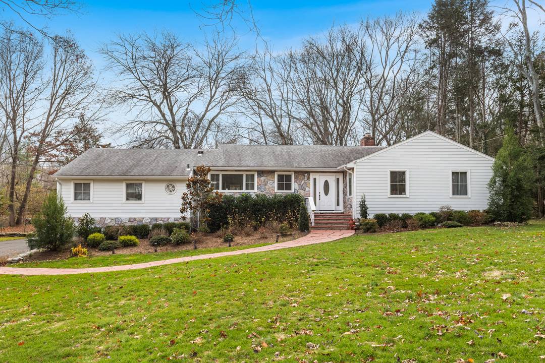 Exquisite and luxurious, this completely remodeled North Stamford ranch sits on 1.