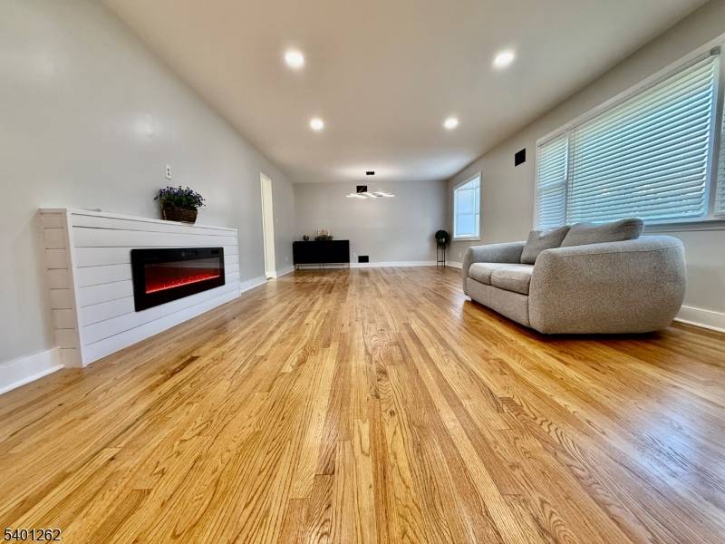 NESTLED prominently on over 1 3 acre, this RANCH offers COMFORTABLE one floor living in a SPACIOUS DESIGNER RENOVATED OPEN FLOORPLAN.