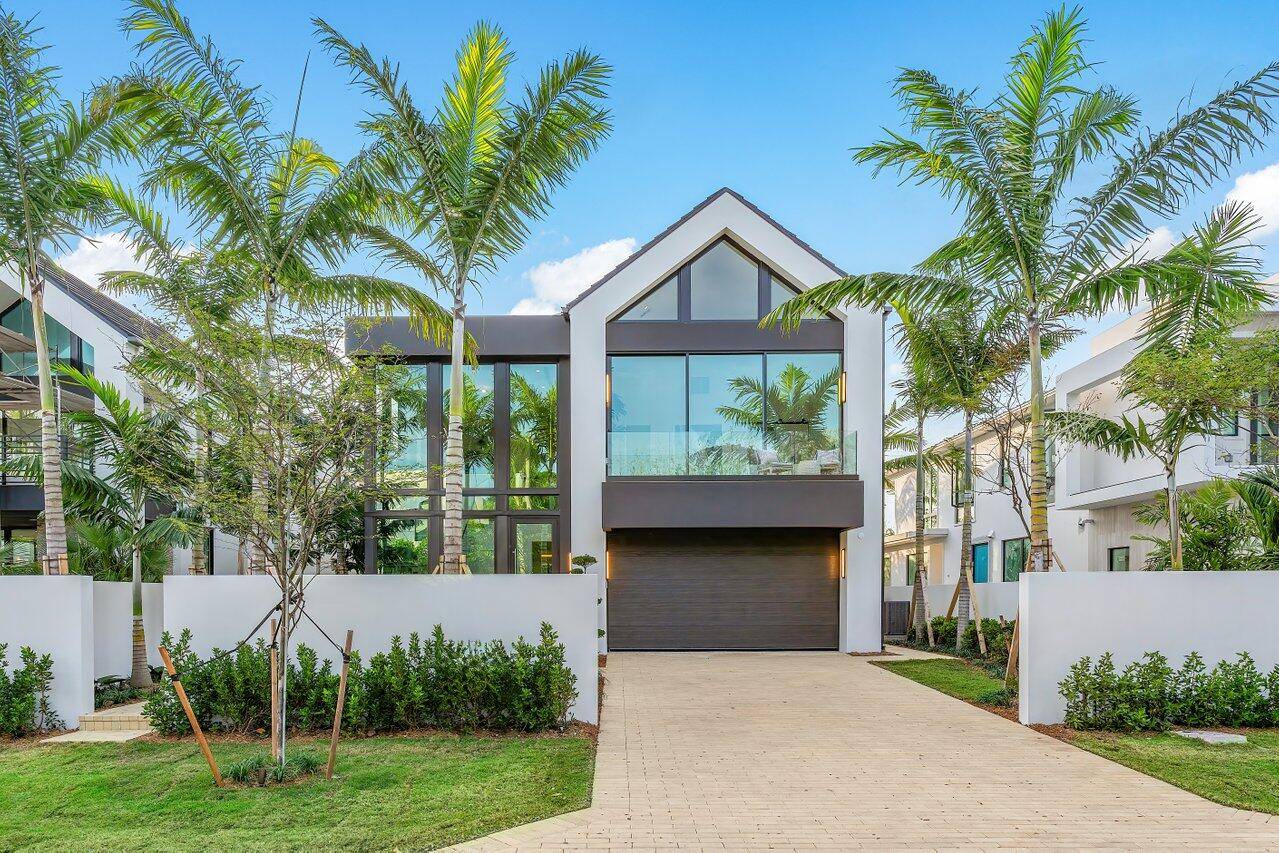 In Delray Beach's sought after Palm Trail neighborhood, 508 NE 7th Avenue, Delray Beach, FL 33483 is a modernist masterpiece by Stamm Development Group.