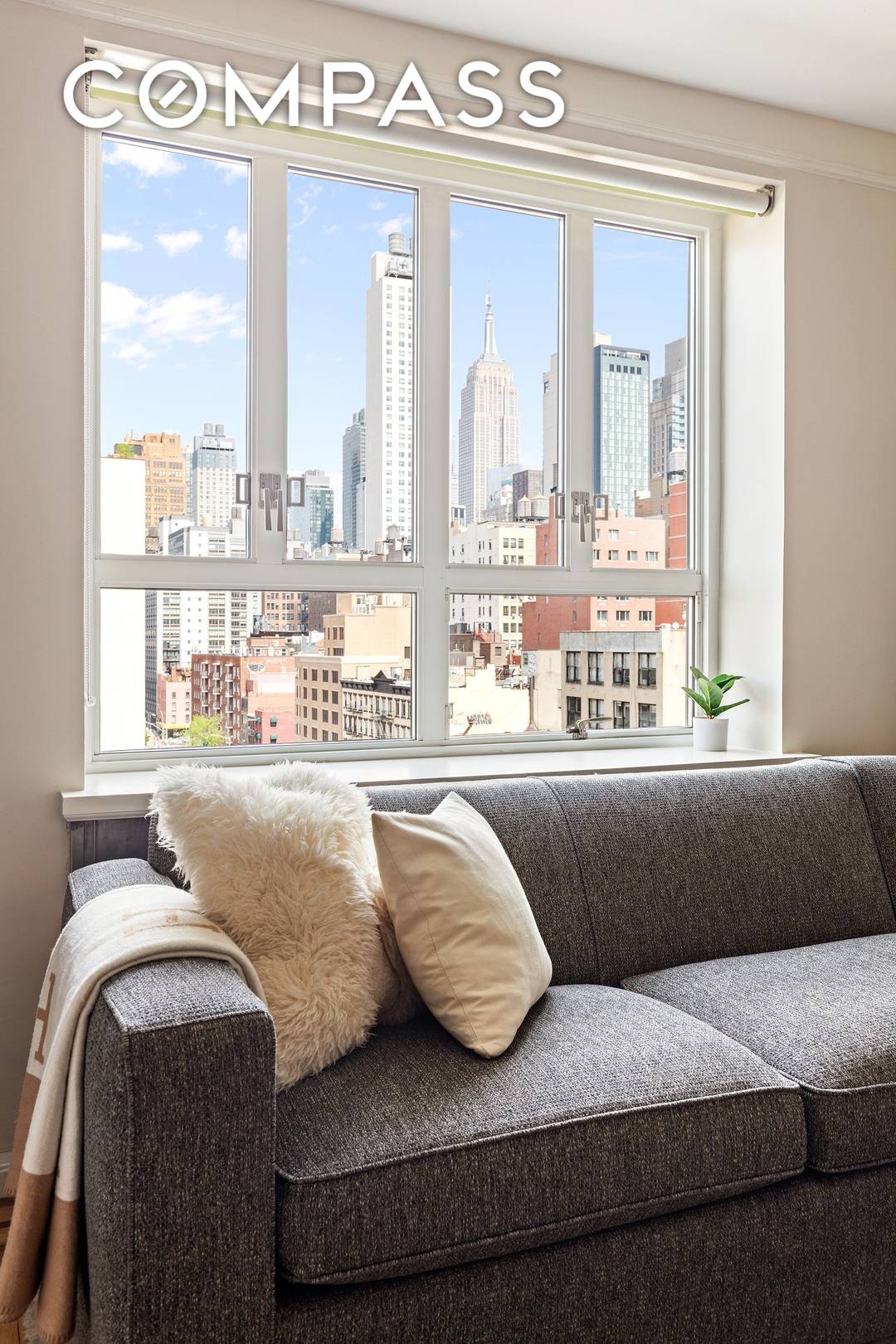 Welcome home to this beautifully renovated prewar studio in the heart of Chelsea with city views of the Empire State Building and Hudson Yards.