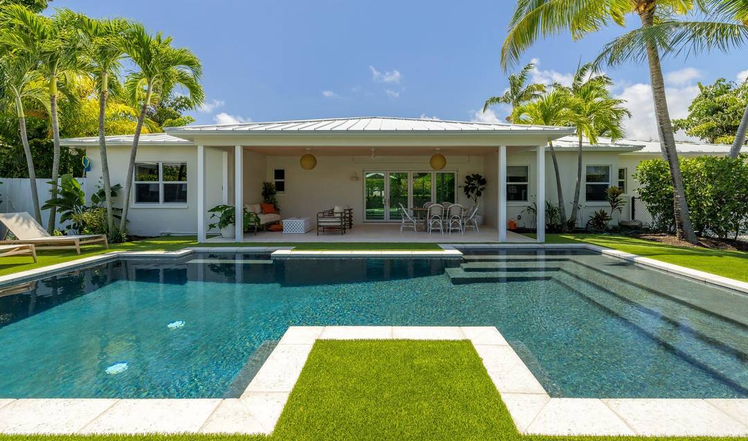 Beautifully renovated and designer furnished, this turnkey property offers relaxed coastal living on a coveted intracoastal block in the popular ''SoSo'' neighborhood of West Palm Beach.