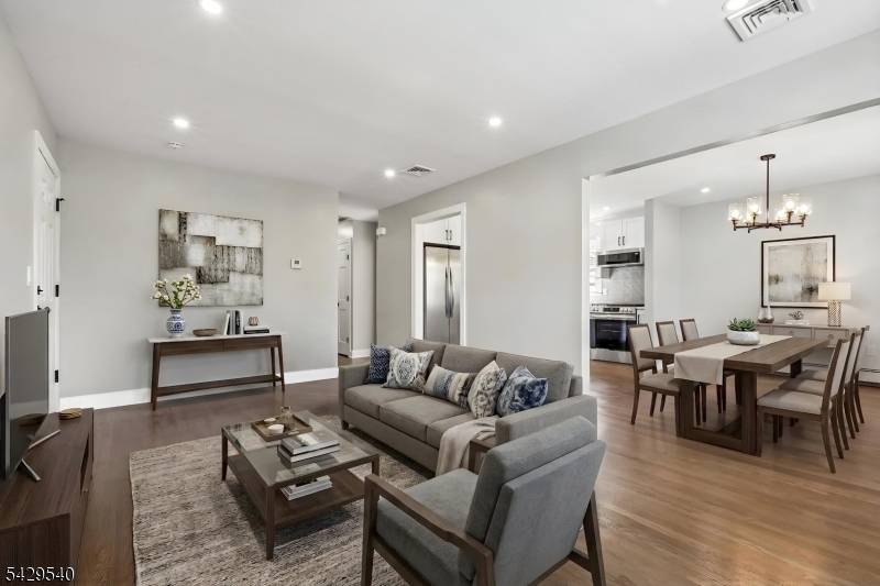 Thoughtfully updated 2 family home in one of Maplewood's most convenient neighborhoods.