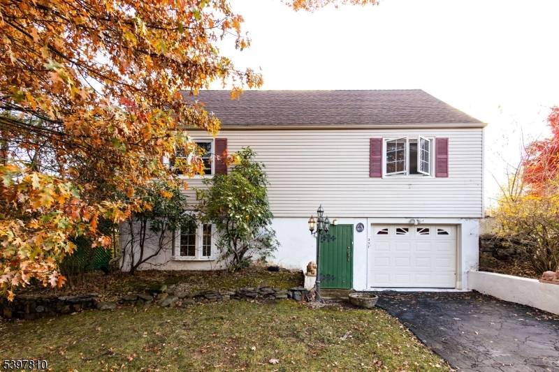 Welcome to this bright and inviting 3 bedroom, 3 bathroom home, thoughtfully set back from the road in the highly desirable heart of North Caldwell !