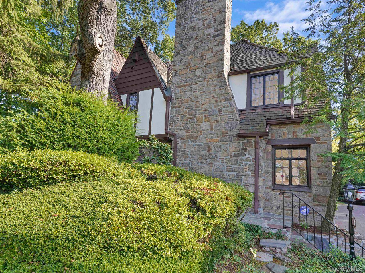 CASTLE ON THE HILL Welcome to 76 Vaughn, your nearly 3, 000 sf, 5 bedroom Tudor home where old world charm meets modern conveniences.
