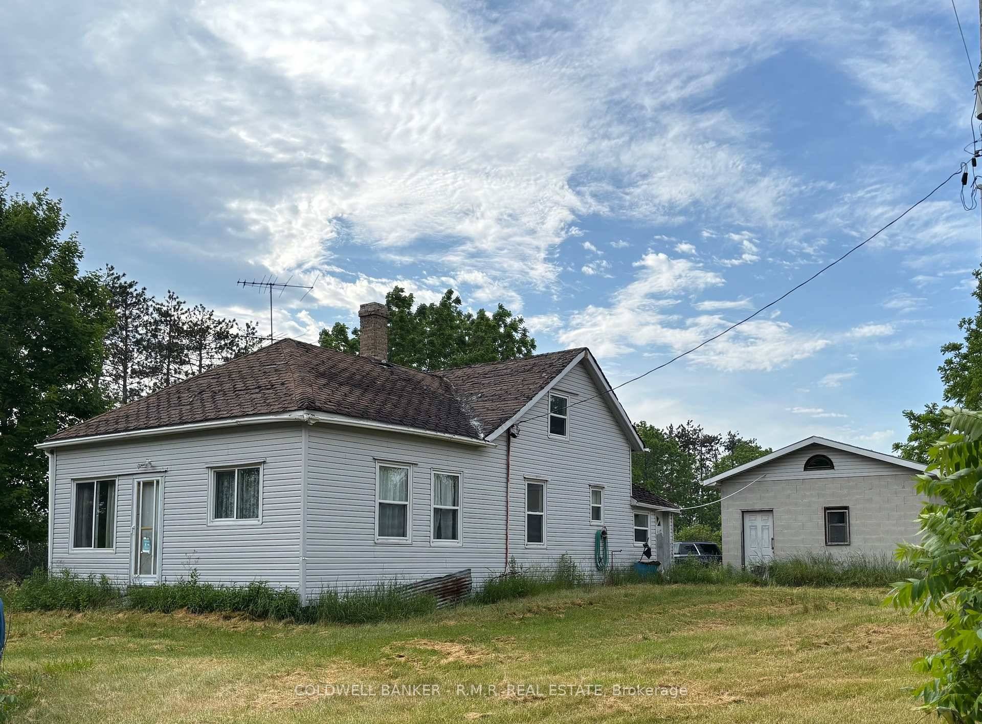 Opportunity awaits you on this 103 acre property with a 4 bedroom, 1 bathroom home set back from the road.