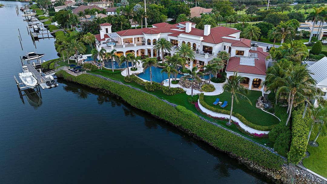 Introducing the Ultimate Trophy Property in Admirals Cove an architectural triumph nestled within one of Jupiter's most exclusive waterfront communities.