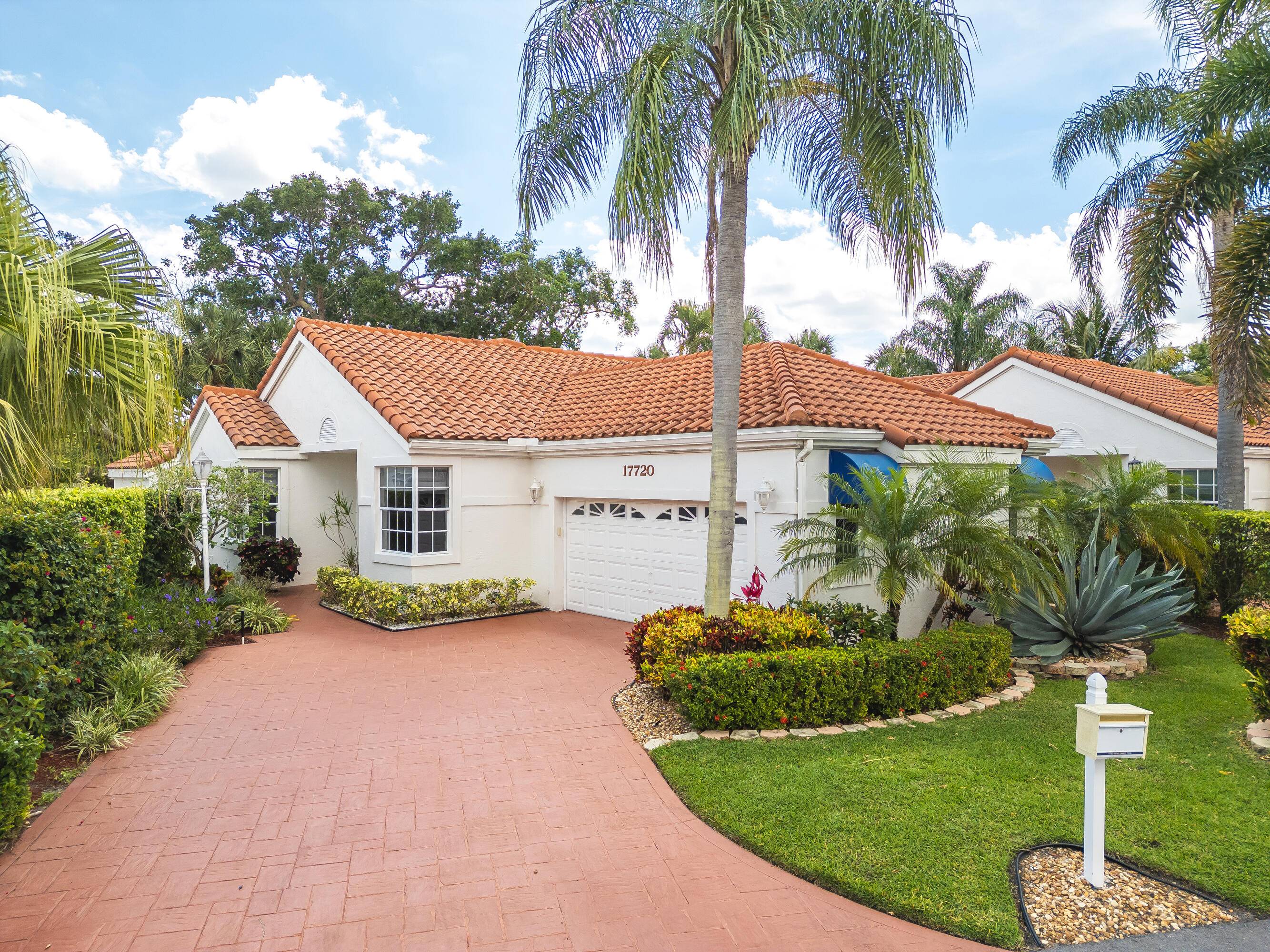 Beautiful 3 Bedroom 2 Bath single family home situated on a private lot overlooking the golf course in Boca Country Club.