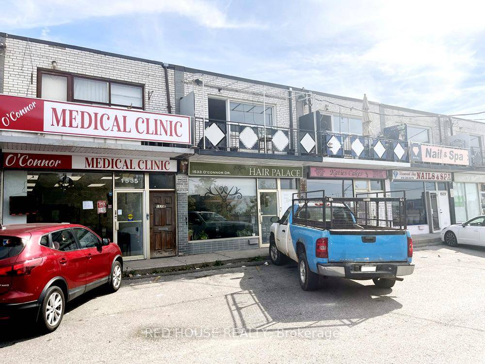 Excellent Opportunity to Own a Mixed Use Property Live and Work, with Two Residential Rental Units and a Commercial Main Floor Unit with Great Exposure on a Busy and Popular ...