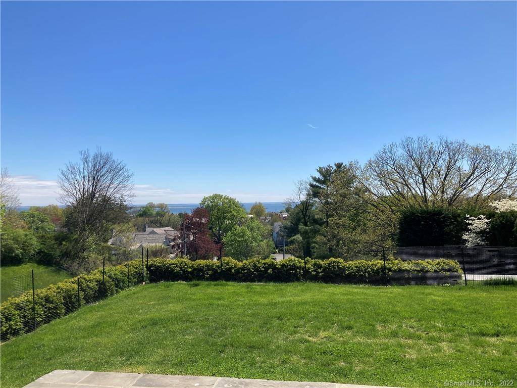 Panoramic water views of Long Island Sound defines this Modern Mid Century Architectural gem set on an acre of beautiful grounds with a heated gunite pool.