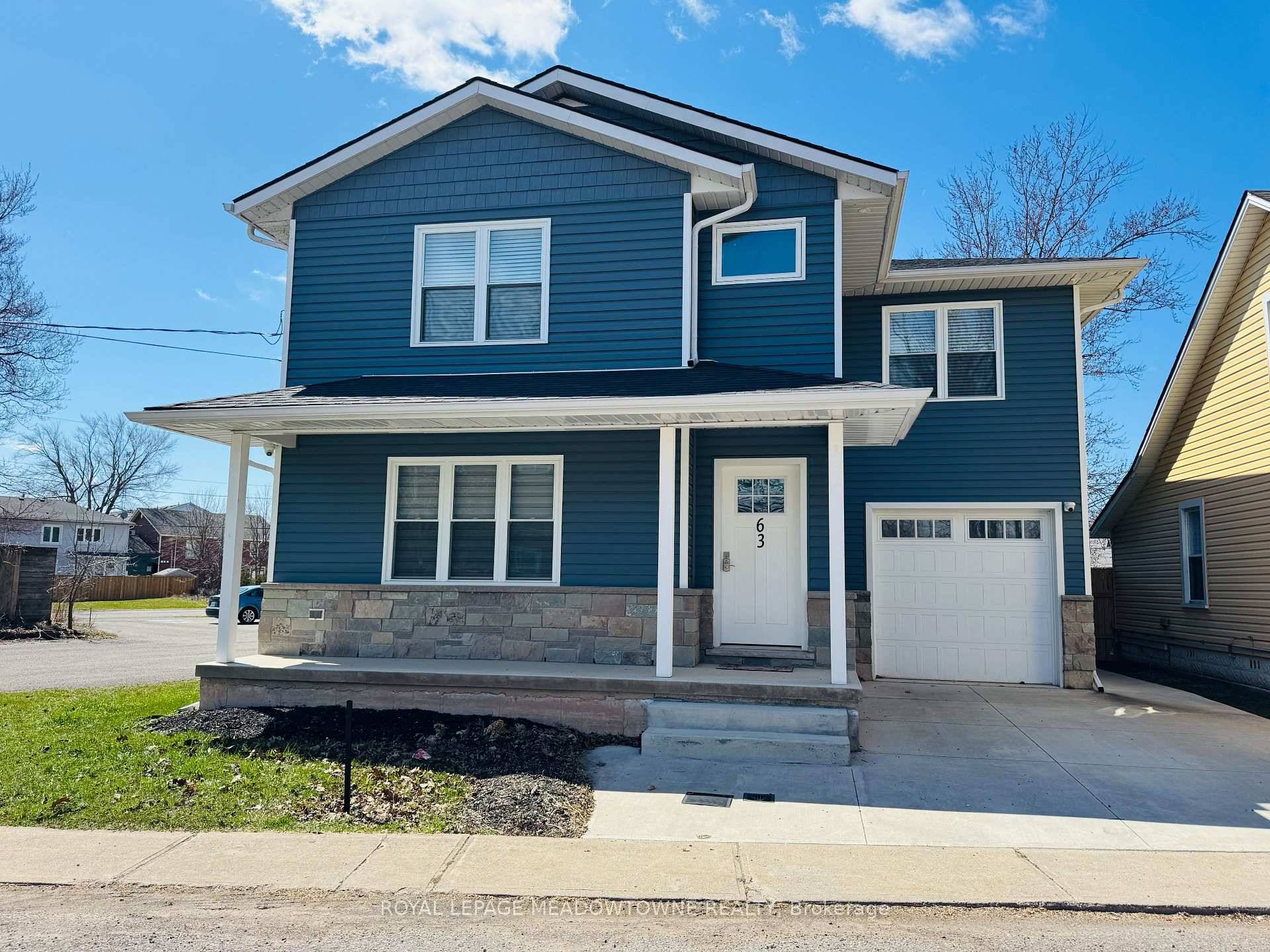 Move in ready ! Four year old custom built home filled with light, character amp ; space.