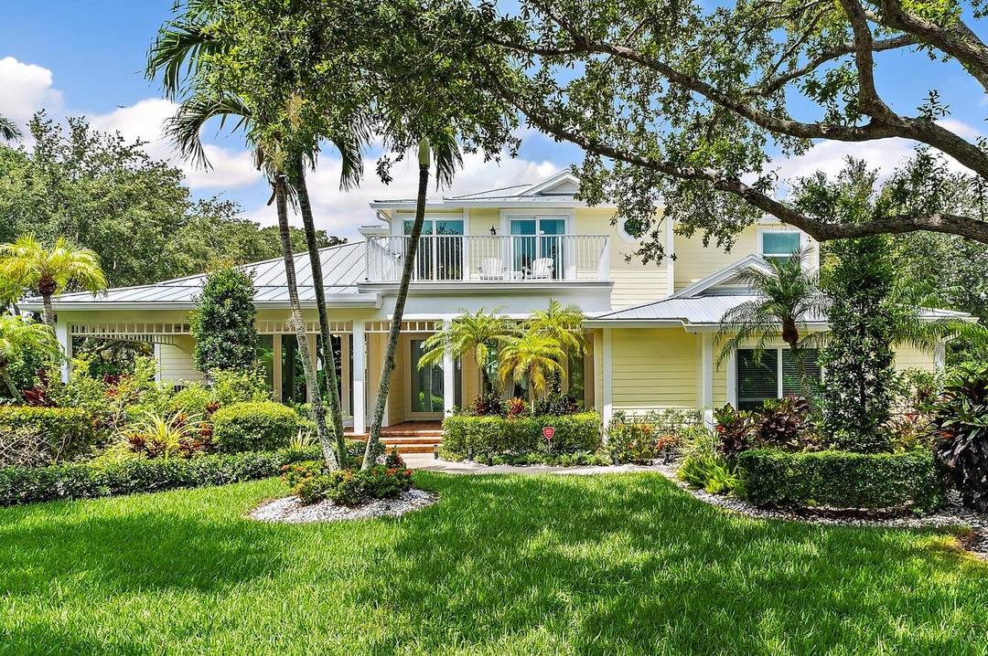 Total professional renovation, move in ready, concrete block Key West style.