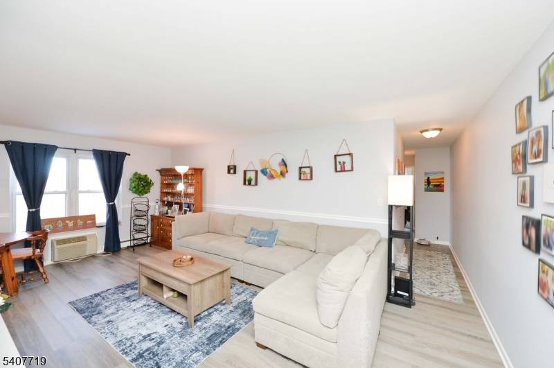 Spacious Corner Unit Condo Offering Living Room Dining Room Combo, Primary Bedroom W Powder Room, Nice Size 2nd Bedroom and Full Bath.