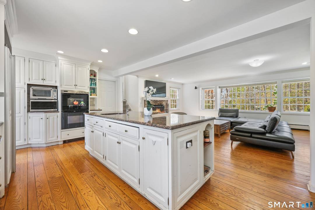 Tucked away on 2. 18 private acres, this beautifully designed 5 bedroom, 6 bathroom home offers exceptional space, natural light, and a layout ideal for both everyday living and entertaining.