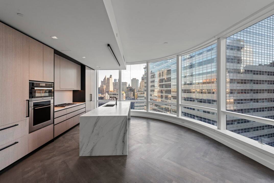 This modern urban enclave offers 1, 573 square feet of sophisticated living with a split two bedroom layout designed for maximum privacy and tranquility.