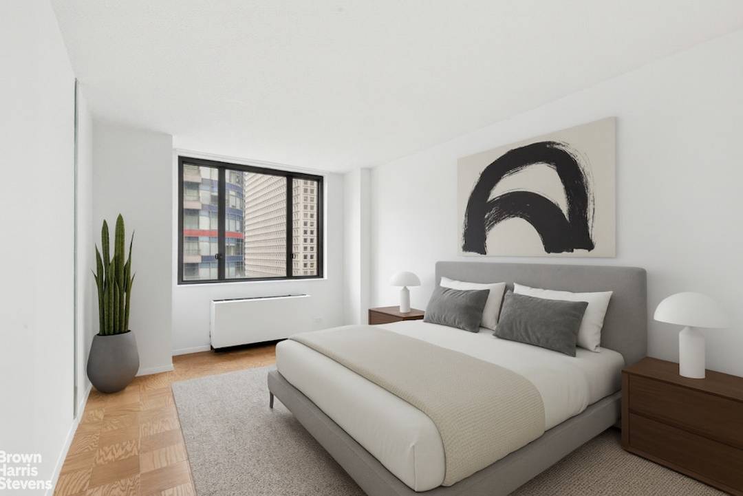 Welcome to Apartment 22G at The Connaught Tower, a spacious one bedroom, one bath residence with a private balcony and iconic views of the Chrysler Building.