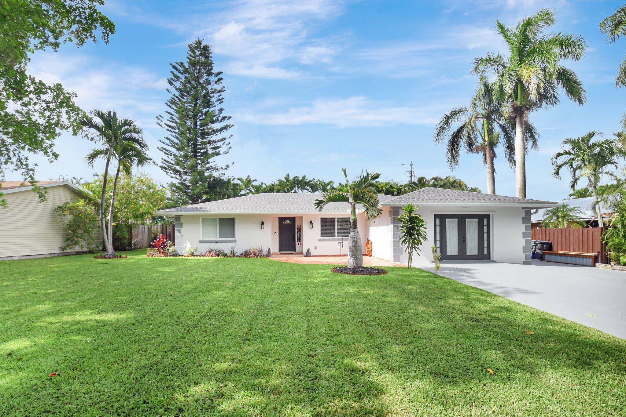 This home is a MUST SEE beautifully updated and meticulously maintained 4 bedroom, 2 bathroom waterfront home offering the perfect blend of comfort, style, and functionality with NO HOA.