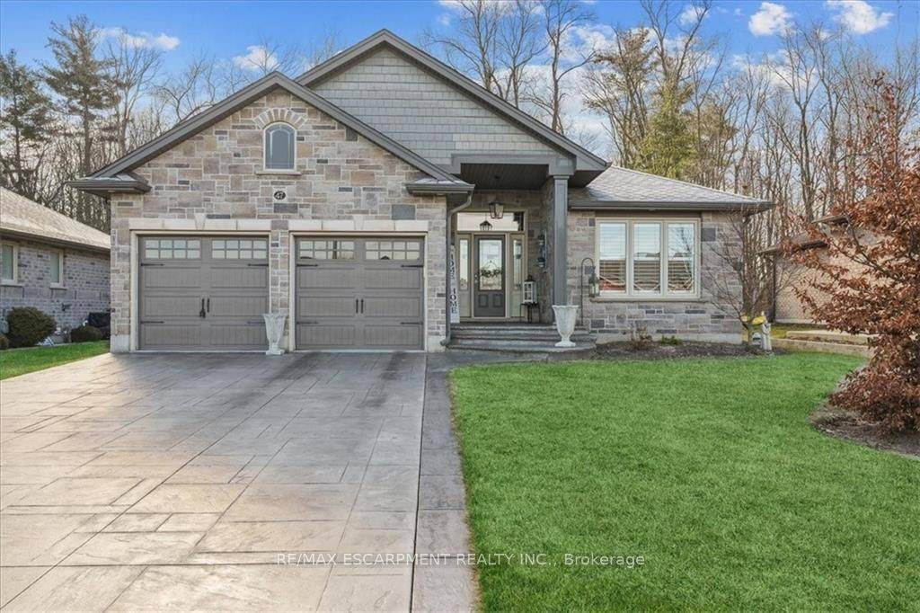 Don't miss this stunning custom built bungalow located in the Harvest Glen neighborhood.