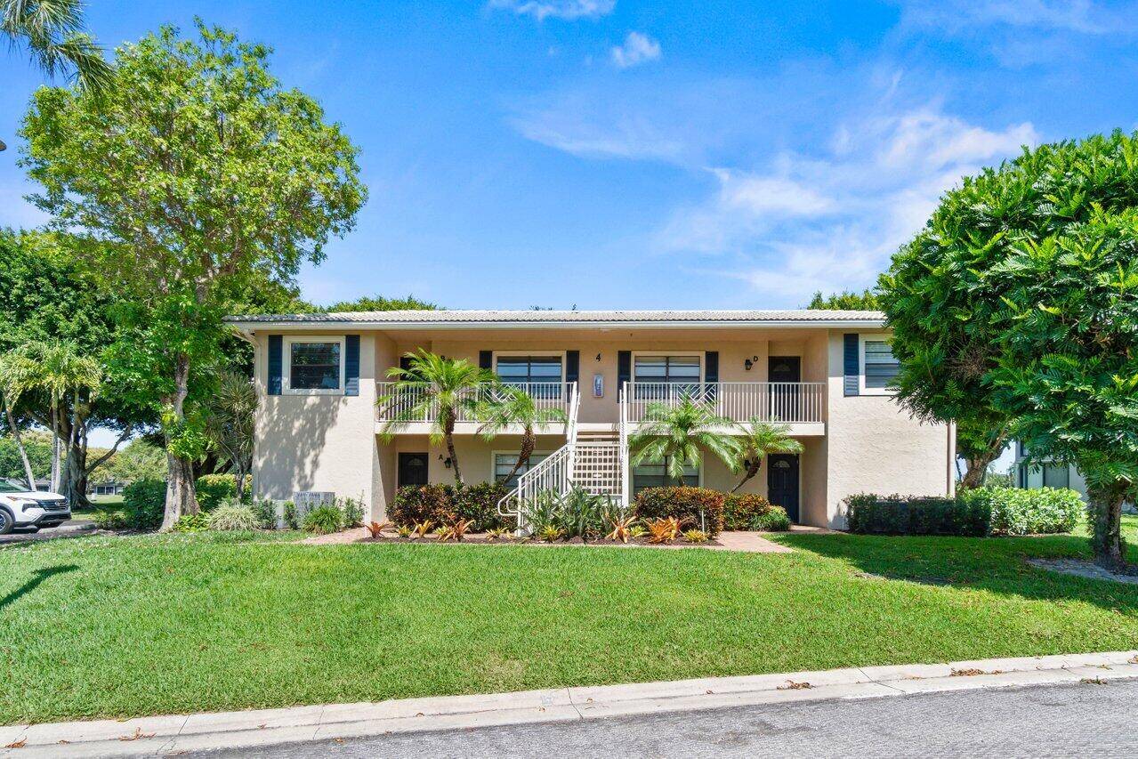Lovely renovated upstairs 3 2 condo with open concept kitchen and a large, screened porch with golf vistas.