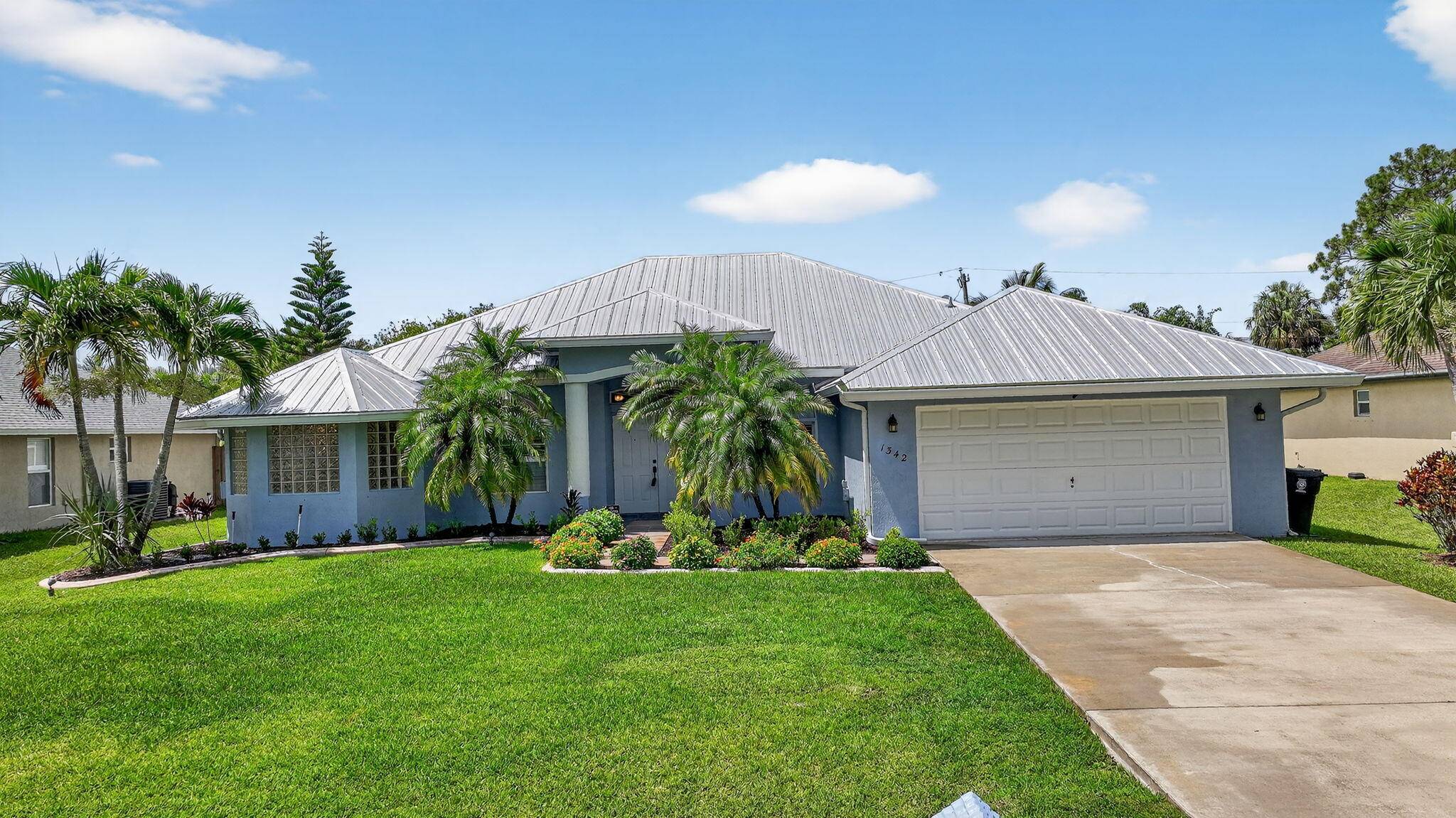 Immaculate Pool Home 3 BR Den Office, 2 BA, 2 car garage big ticket upgrades 2022 new metal roof new HVAC, 2021 water heater, new flooring large updated kitchen.
