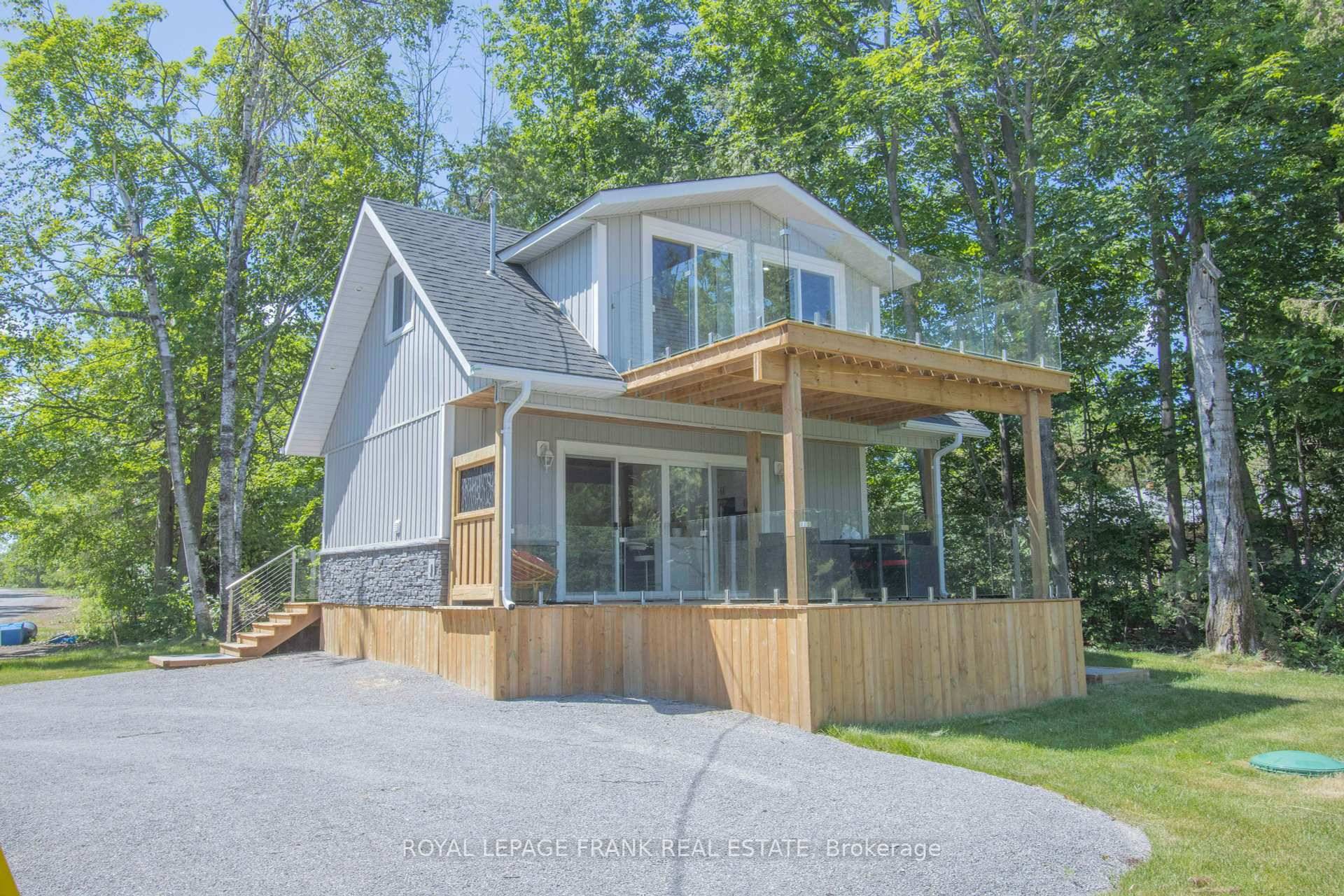 OPEN HOUSE JULY 12 FROM 1PM TO 3PM Welcome to your new four season Waterfront oasis, perfectly situated just minutes from the Sandbar on Pigeon Lake !