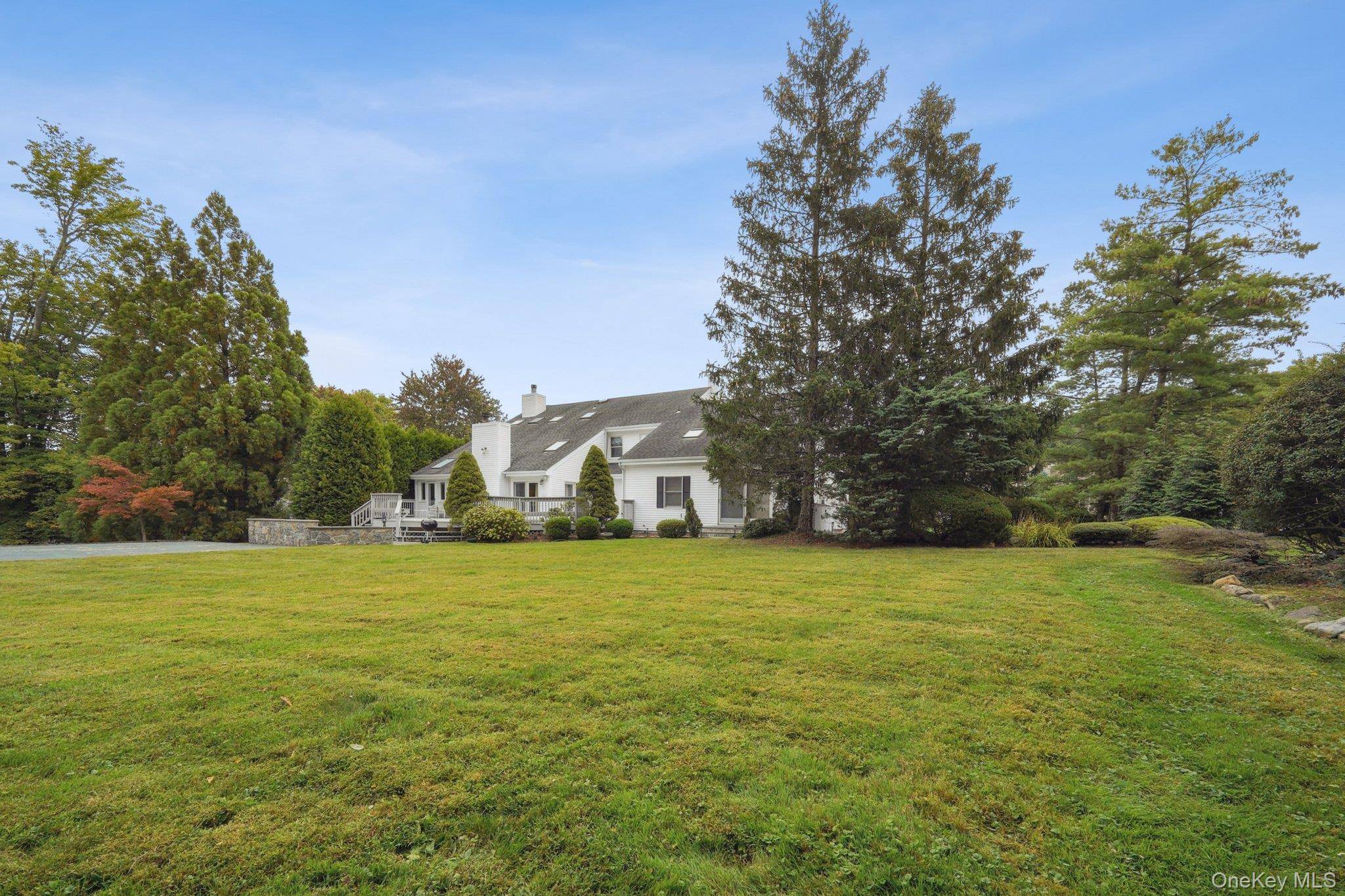 This classic Colonial offers 5 bedrooms and 3.