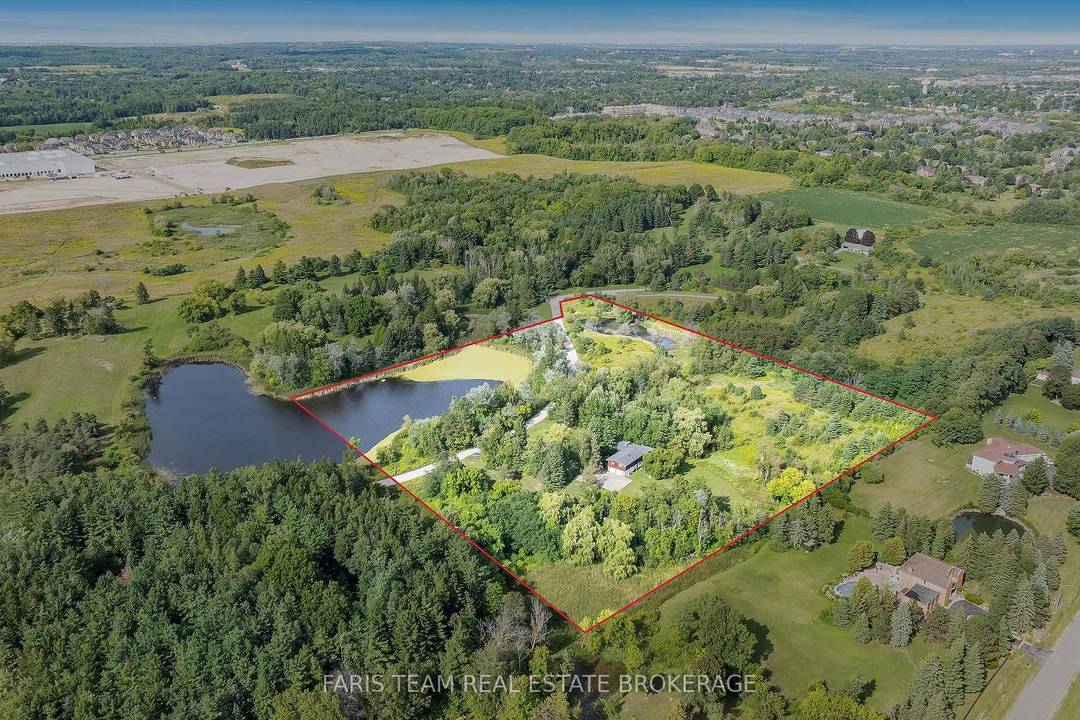 Top 5 Reasons You Will Love This Home 1 Discover this rare offering of a charming bungalow set on 10.