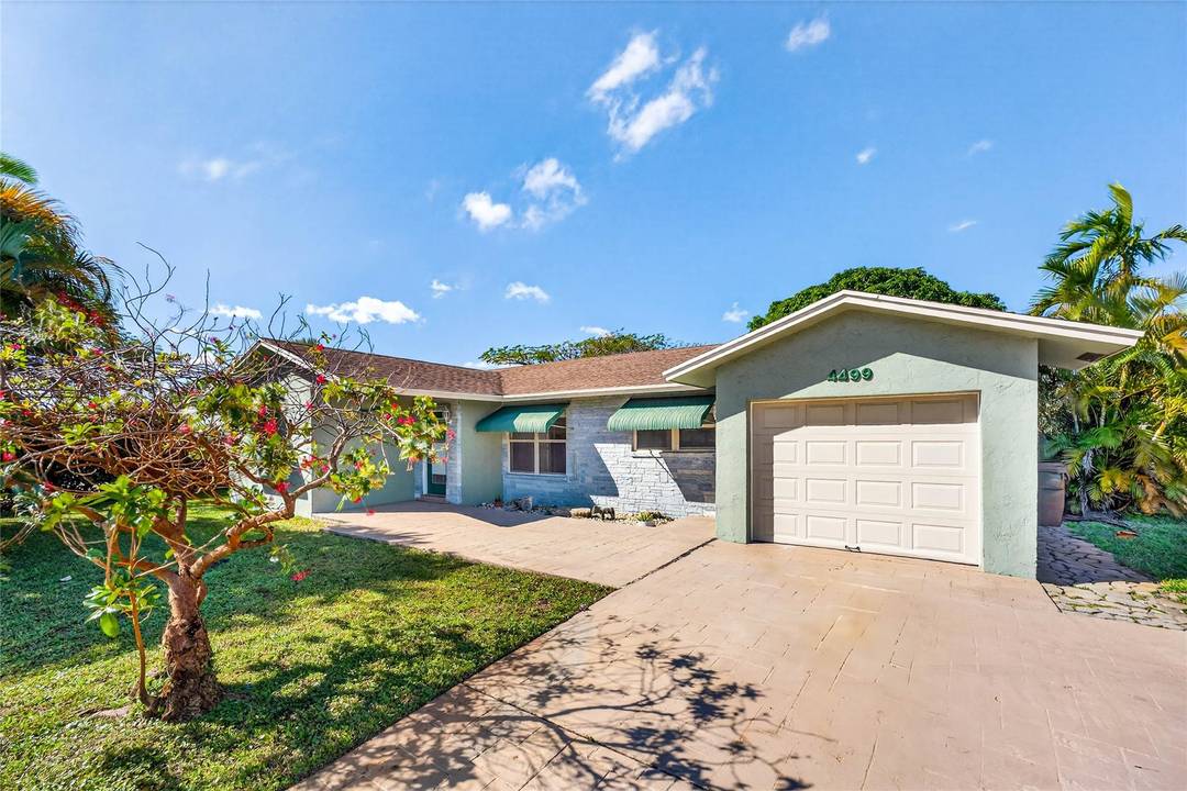 Rare East Boca 4 Bedroom Home with Oversized Yard, Boat RV Parking amp ; Prime University Location.