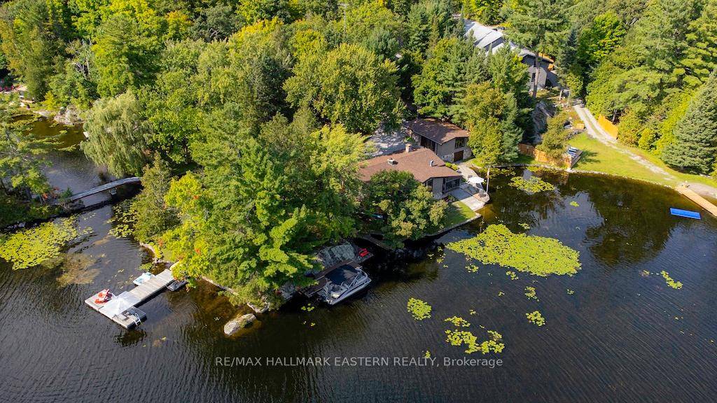 This rare and sought after waterfront property on Lower Buckhorn Lake offers an impressive 380 feet of private waterfront, providing breathtaking water views in every direction.