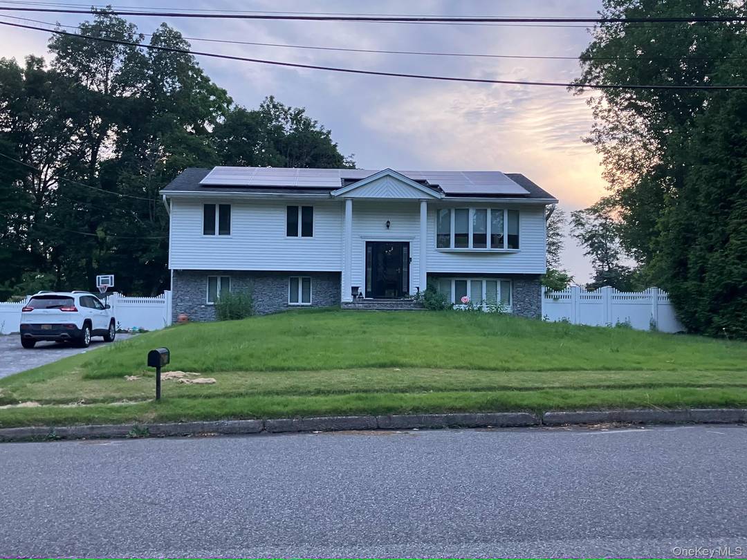 Welcome to this spacious and well maintained Hi Ranch located in Hauppauge !