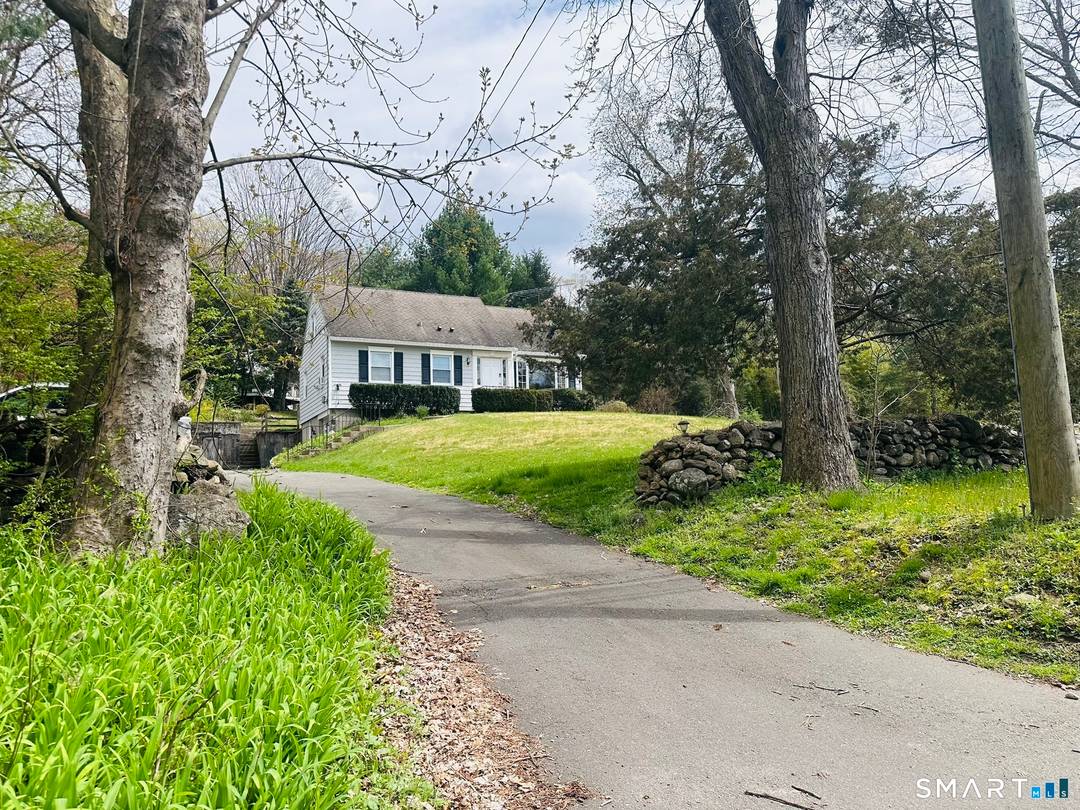 Delightfully renovated cape located centrally in New Canaan.