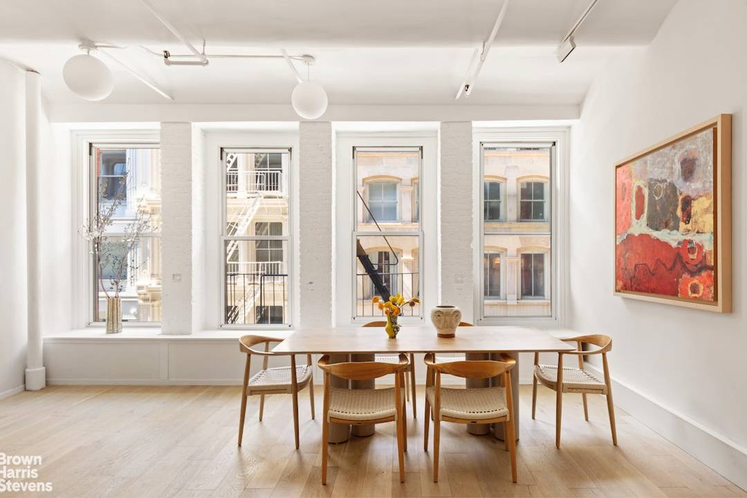 History and luxury mingle to stunning effect in this serene and meticulously renovated full floor loft located on a prime cobblestone block in Soho's iconic Cast iron District.
