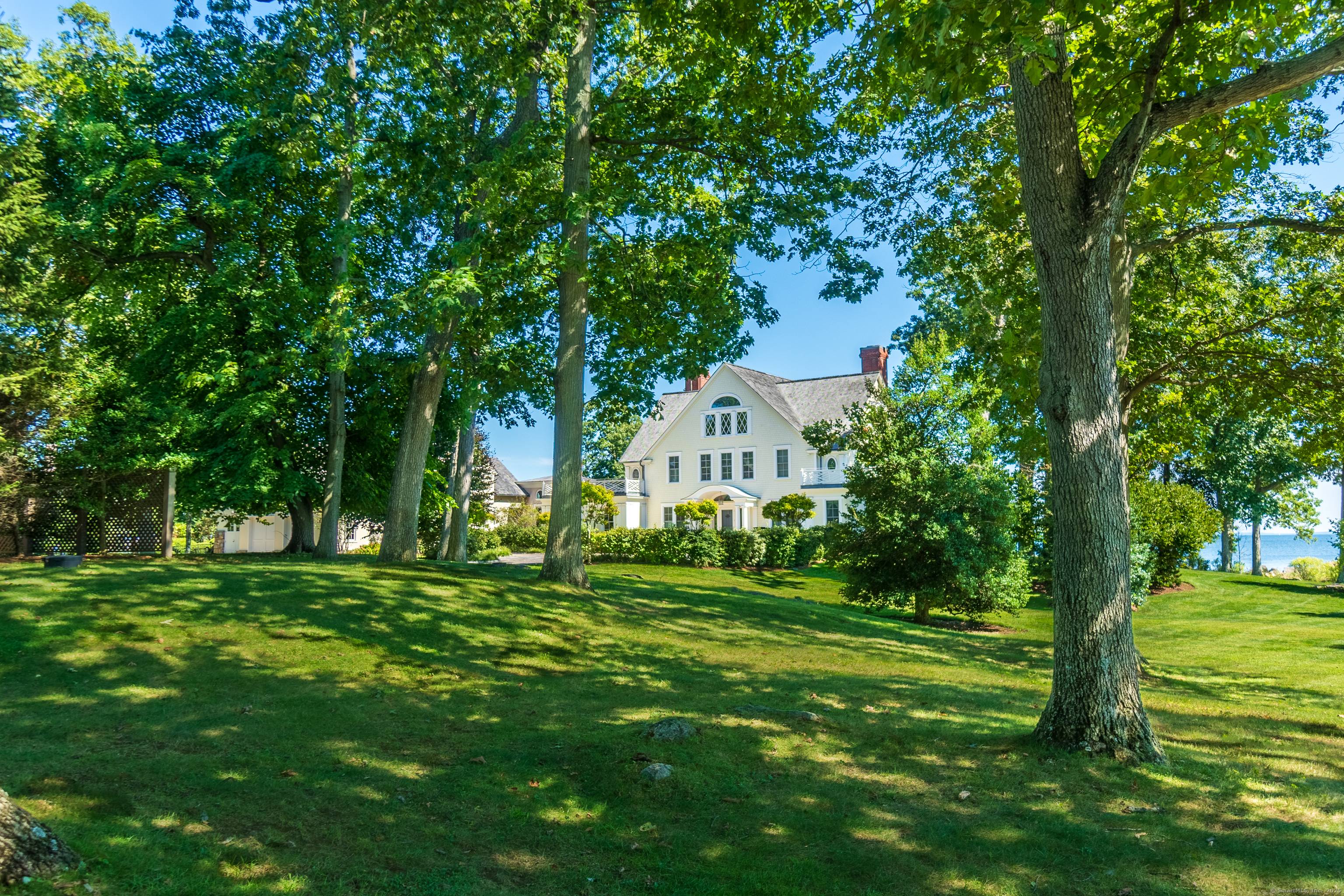 HAY ISLAND Breathtaking, unobstructed views of the Long Island Sound stretch from this private island at the end of a gated causeway on Darien's cherished waterfront coast.