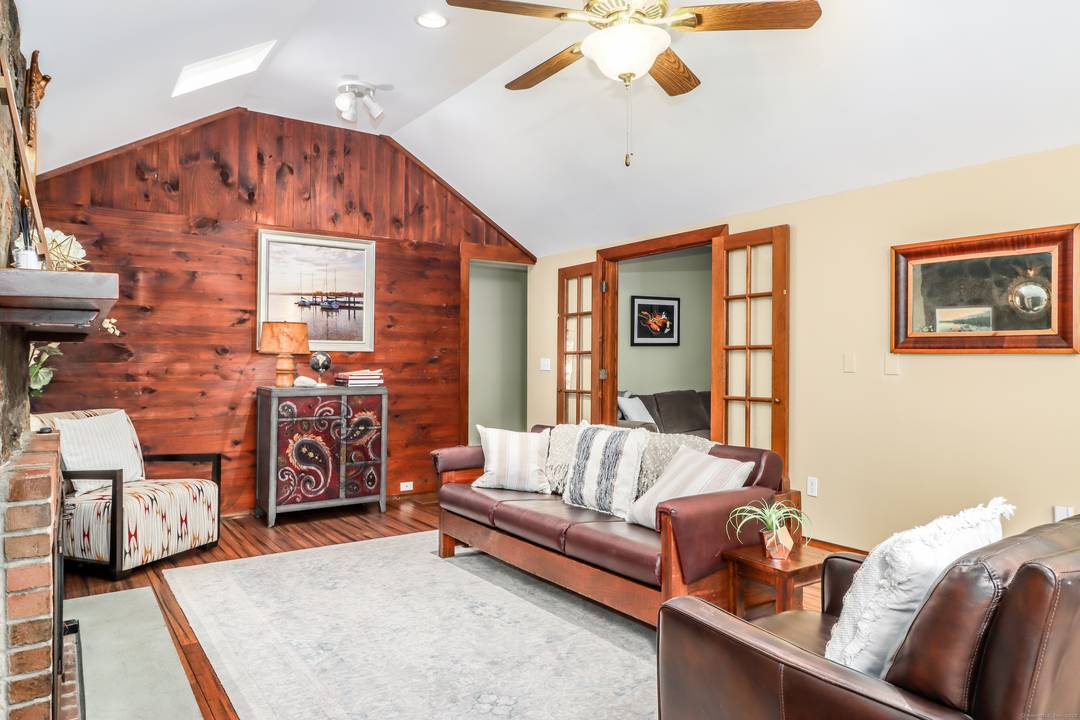 Welcome to 5 Birch Lane, a beautifully appointed home nestled within the highly sought after Candlewood Lake Club community.