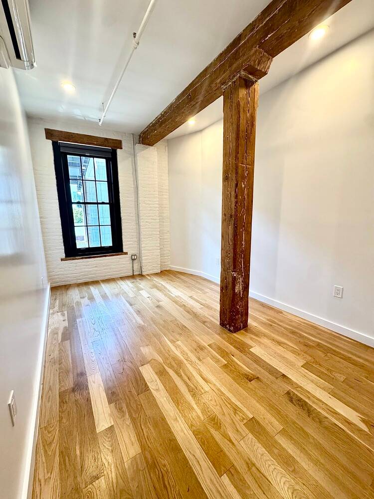 Step into this SoHo style loft where timeless character meets modern luxury.