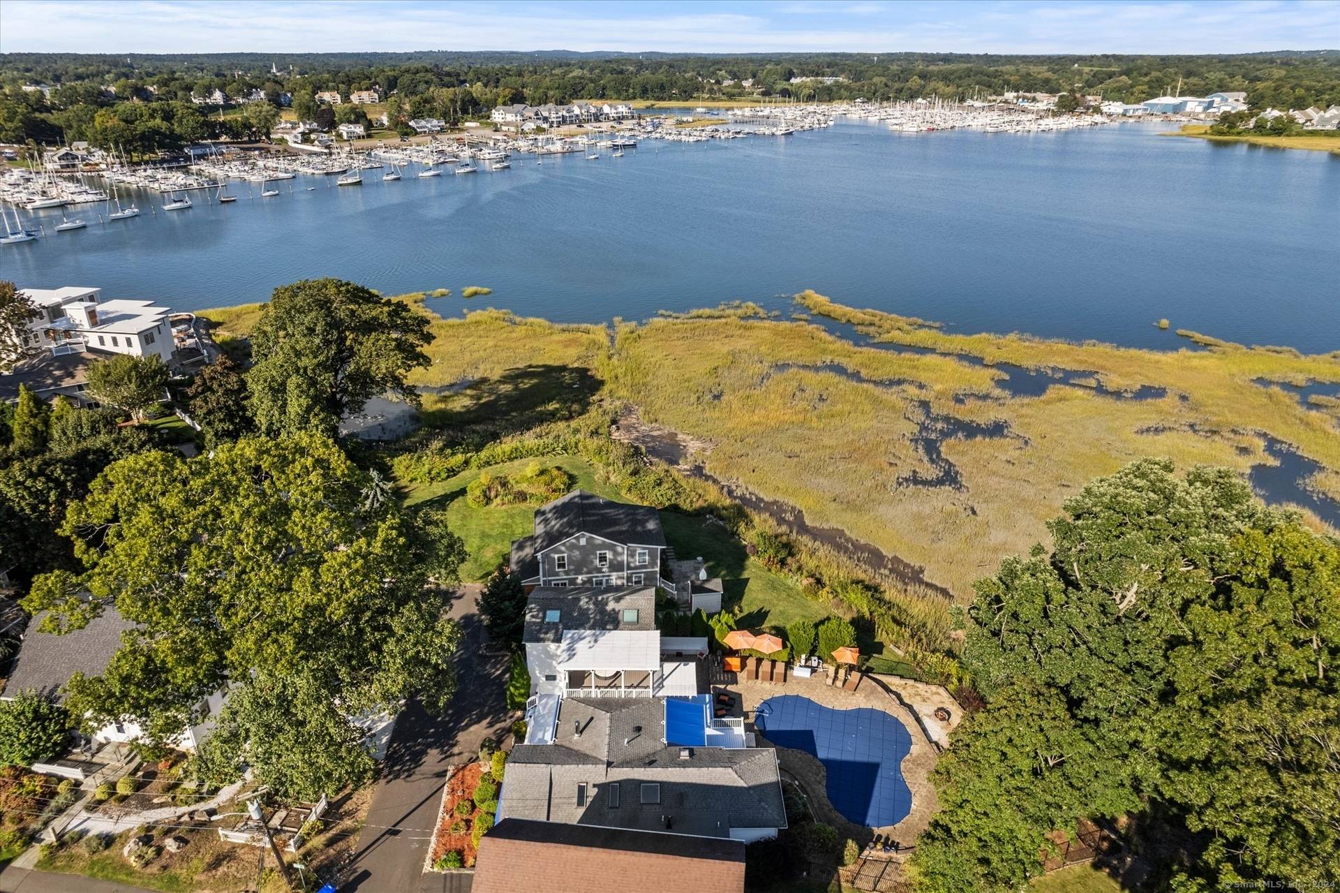 Escape to this stunning waterfront oasis offering resort style living, deeded beach rights, and the perfect blend of elegance and comfort.