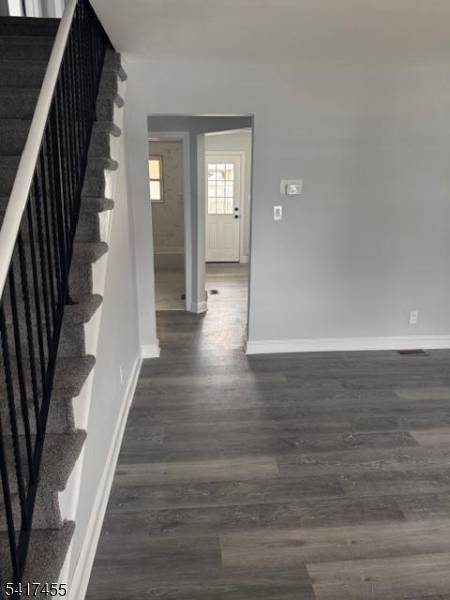 Completely renovated 4 bed, 2 bath Cape Cod with rocking chair front porch and huge back deck in neighborhood of many fabulous remodeled homes !