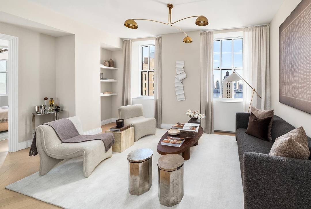 Residence 3603 at One Wall Street is a beautifully proportioned two bedroom, two bath home offering 1, 215 square feet of interior space and prized western exposure.