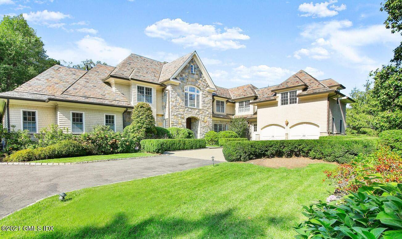 Sun filled stone shingle country house with slate roof and elegant courtyard on private 1.
