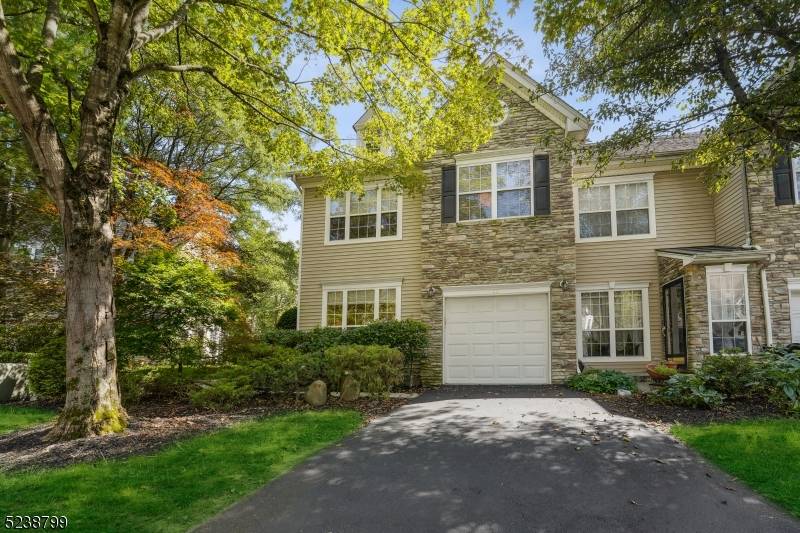 Premium location end unit in Hamilton Ridge overlooking the woods.