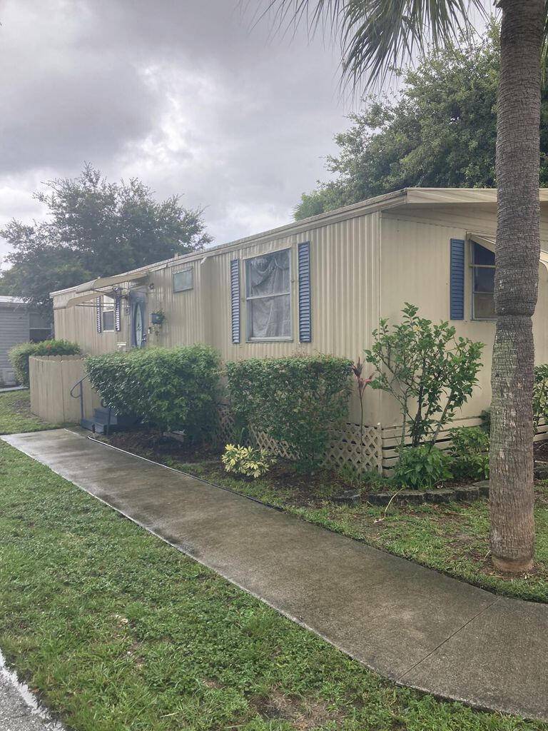 Handyman Special ! 3 Bed 2 Bath Mobile Home All Ages Community in Palm Beach Gardens Sold AS ISOpportunity knocks !