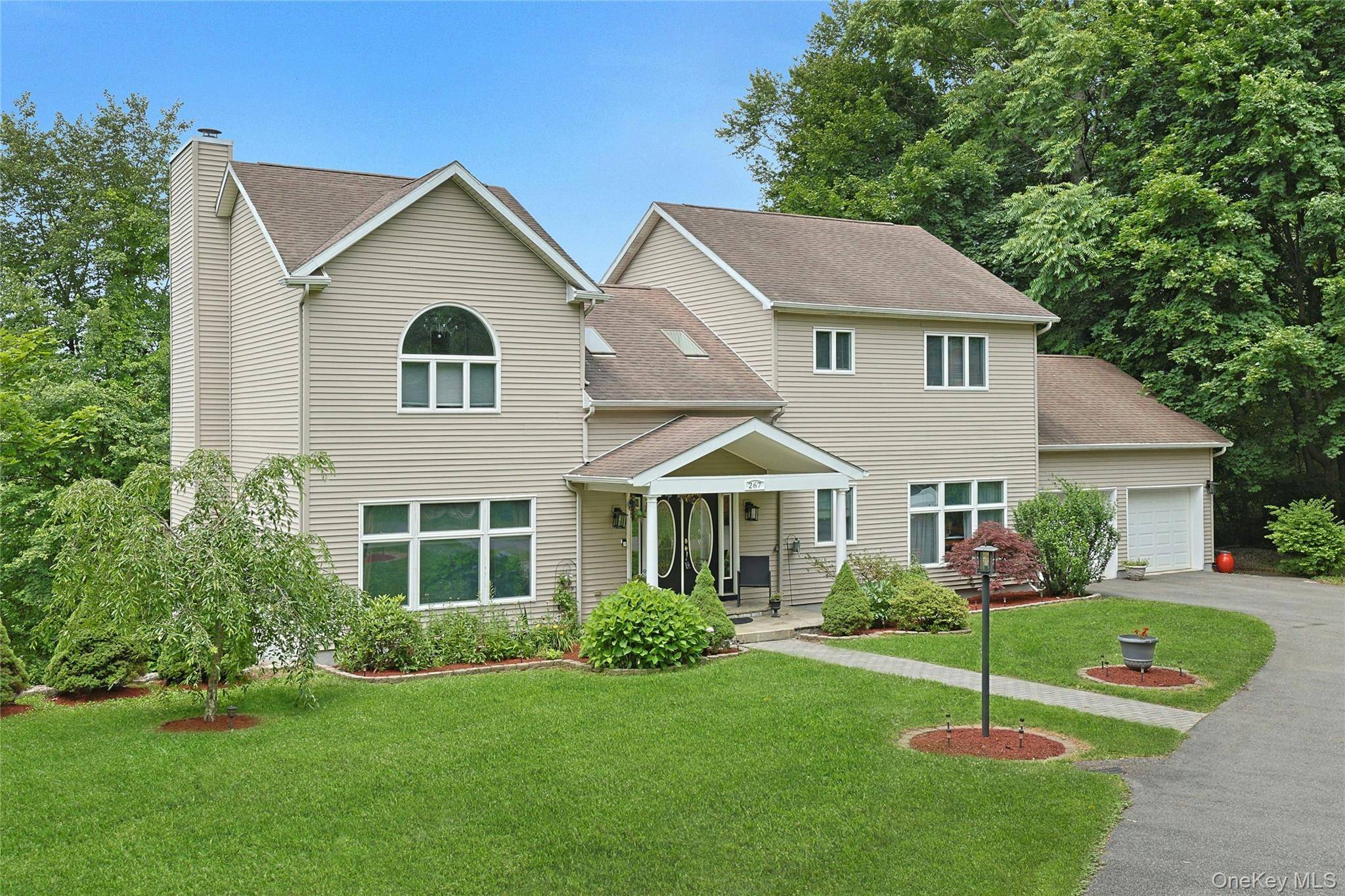 This stunning 3 Bed 2, 5 Bath colonial contemporary boasts a bright, airy interior.