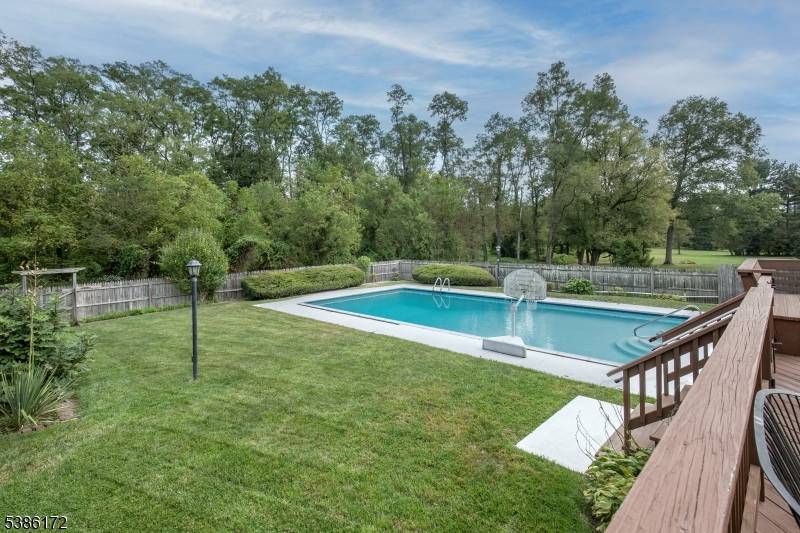 Set on nearly an acre in one of Basking Ridge's most desirable neighborhoods, this true 5 bedroom Colonial offers generous space, timeless style, and a setting of uncommon tranquility.