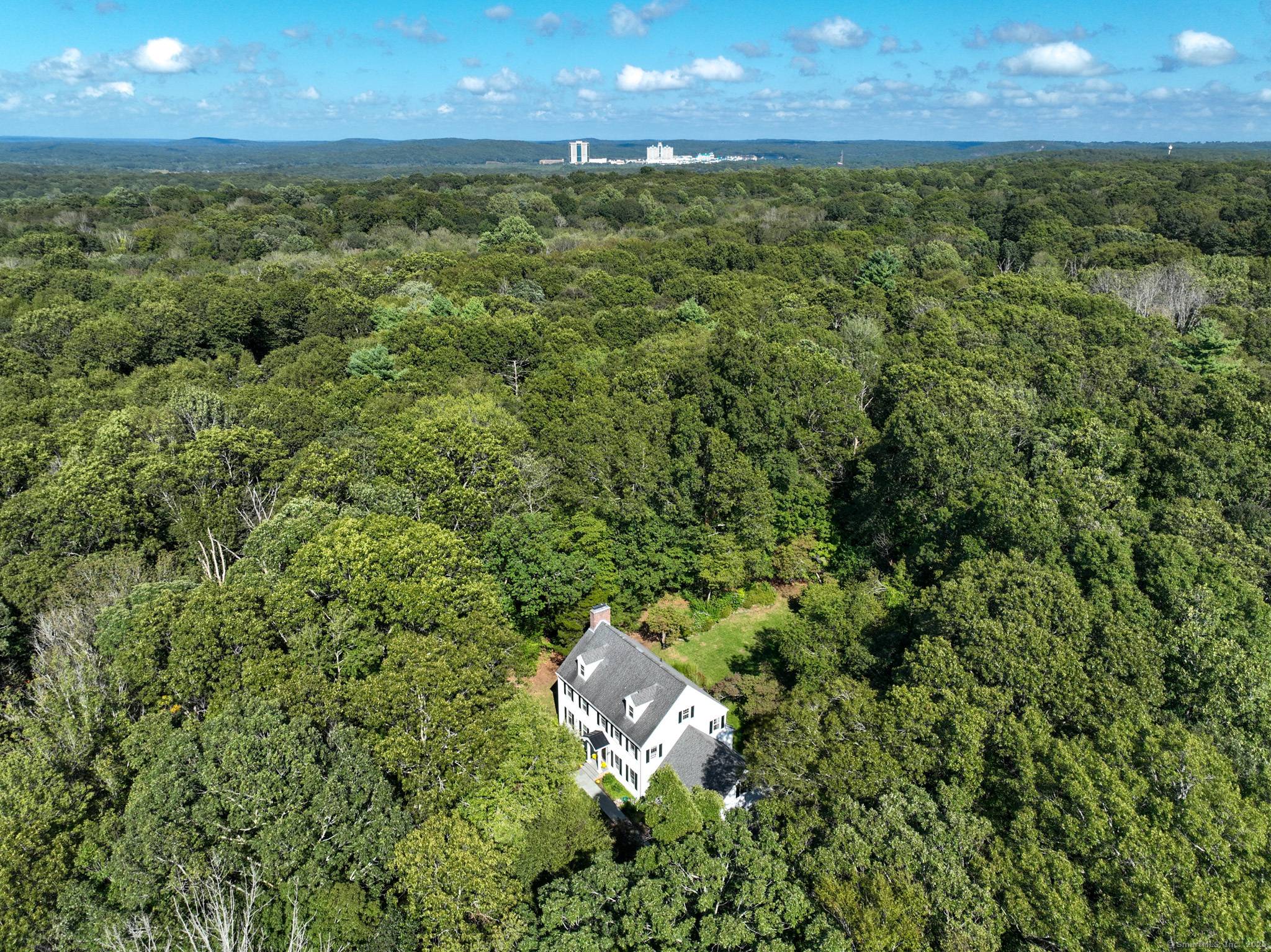 Classic New England Colonial set high on a private cul de sac, this 4 bedroom, 2.