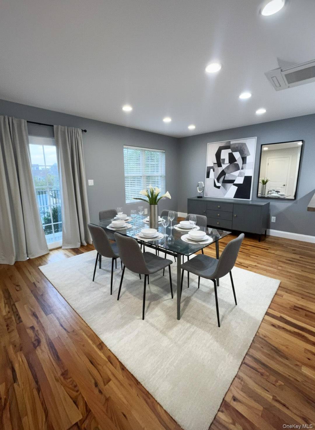 Three spacious bedrooms are located on the second floor, complemented by four total bathrooms for maximum convenience.