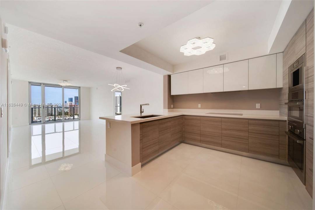 MUST see this 21st floor beautifully appointed 2 bed Den 3 bath luxury condo with 1, 850 sq.