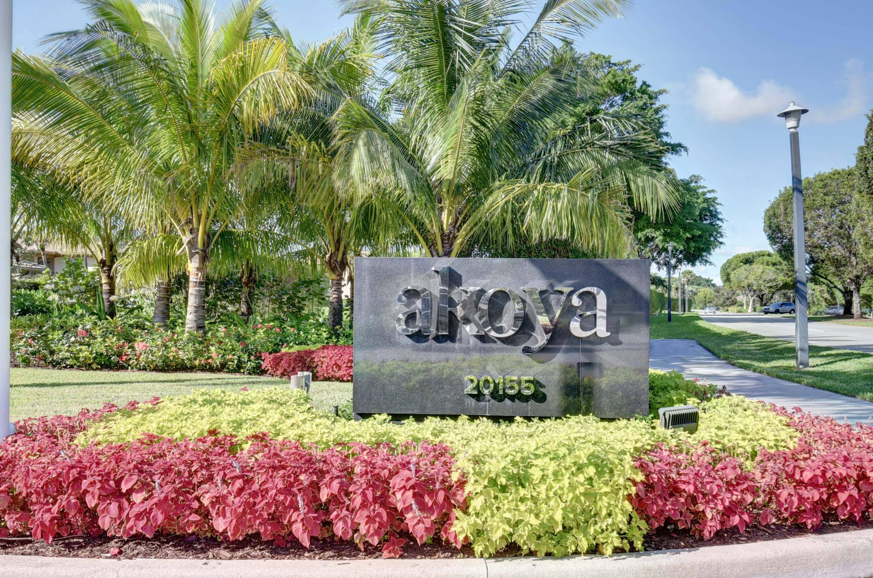Forever golf and sparkling lake views from this beautiful 2 bedroom plus den, 2 1 2 bath condo in the luxurious Akoya complex.
