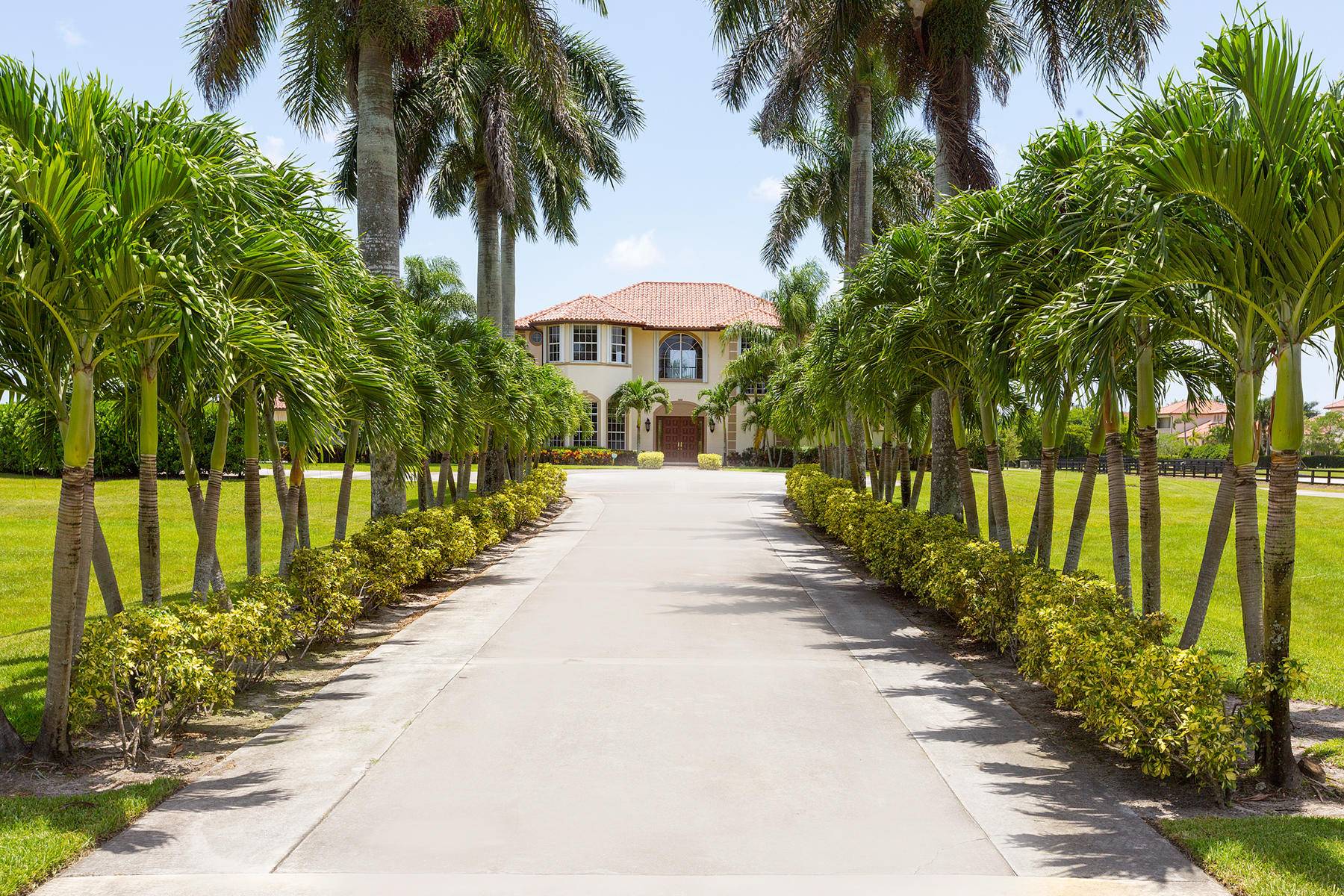 Nestled in the picturesque gated community of Palm Beach Point, this stunning estate epitomizes luxury living.